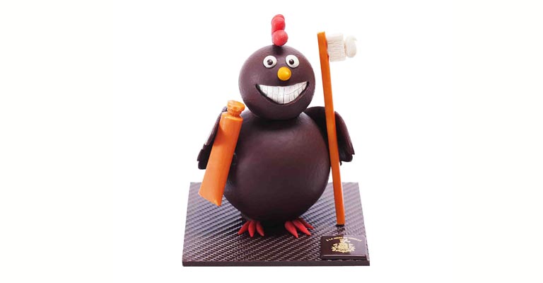 A La mère de Famille l'humour et toujours au menu de Pâques comme cette poule aux dents pepsodent !