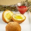 photo Risotto en boule fritte, cœur d'ail et confiture de tomates