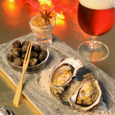 Huîtres en écume de bière, gingembre et zestes d'orange
